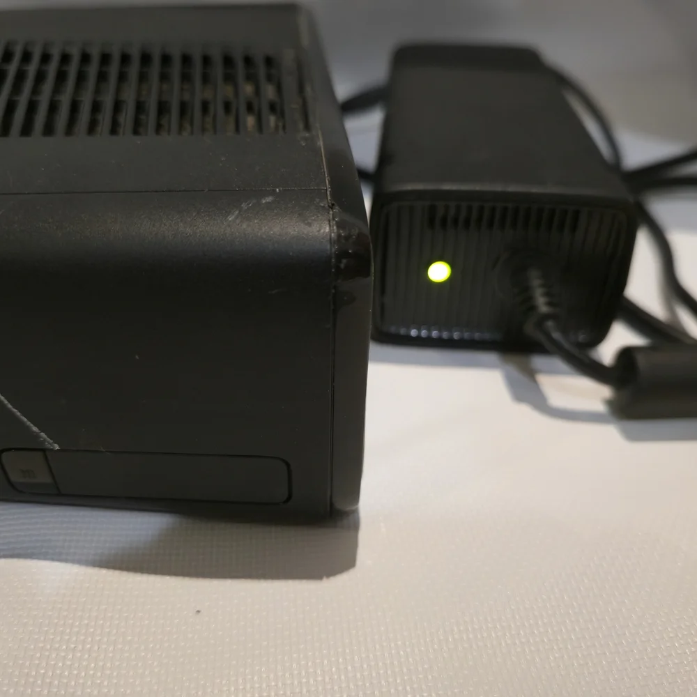 XBOX 360 Console with Black and White Controllers